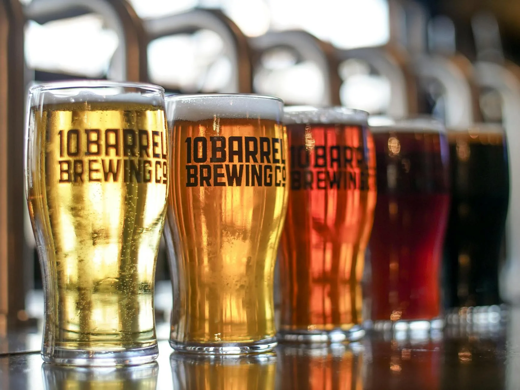 Selection of colourful craft beers in glasses