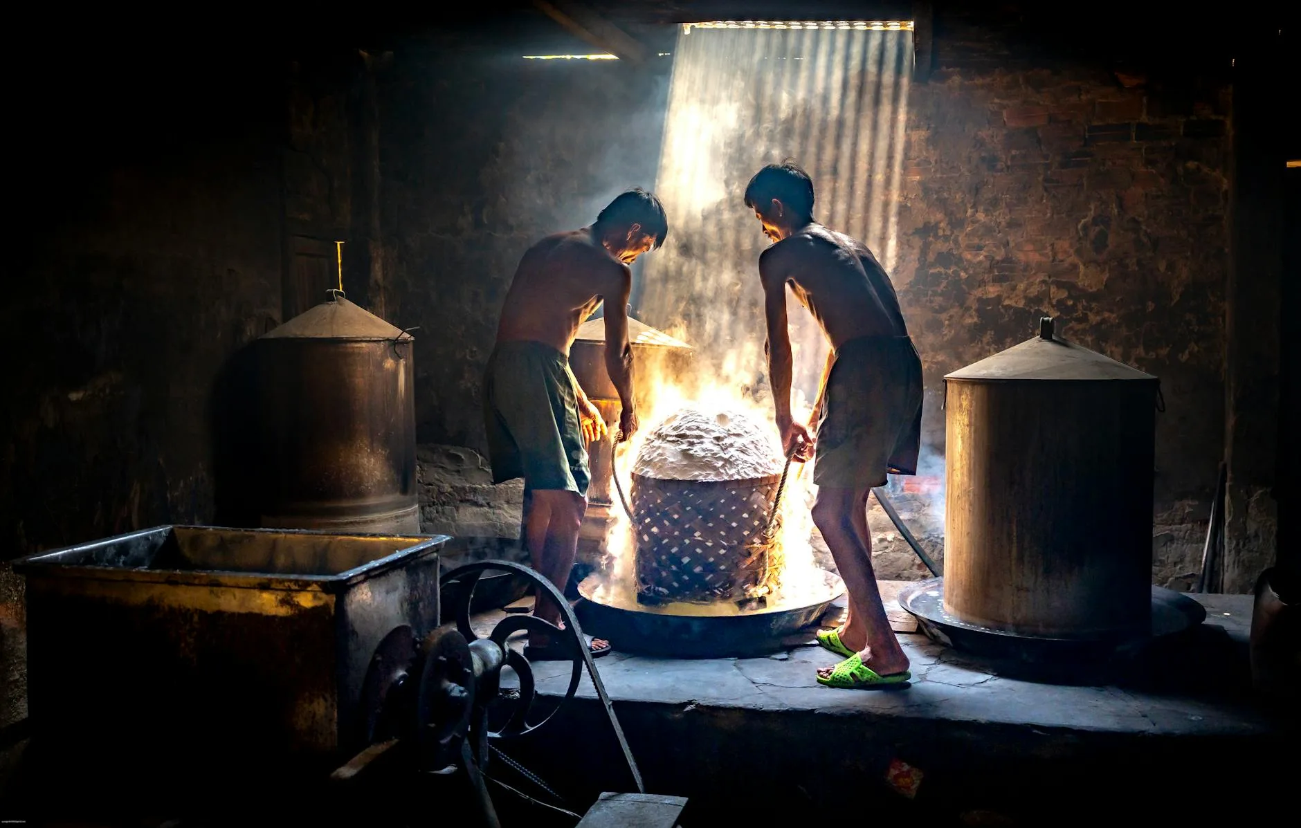 Grain being mashed in a brewery kettle during the brewing process