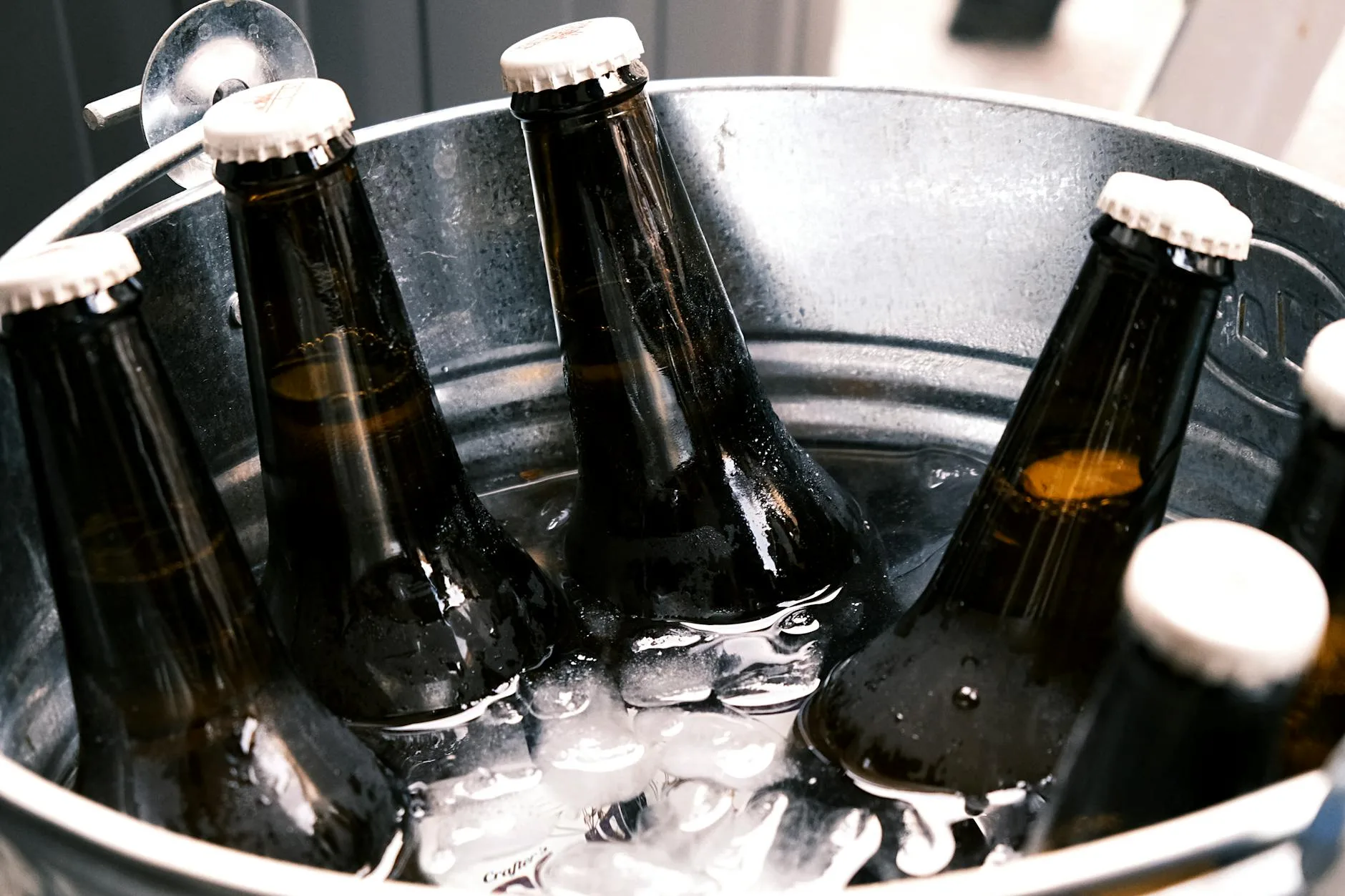 Beer bottles being cleaned and prepared for homebrew bottling