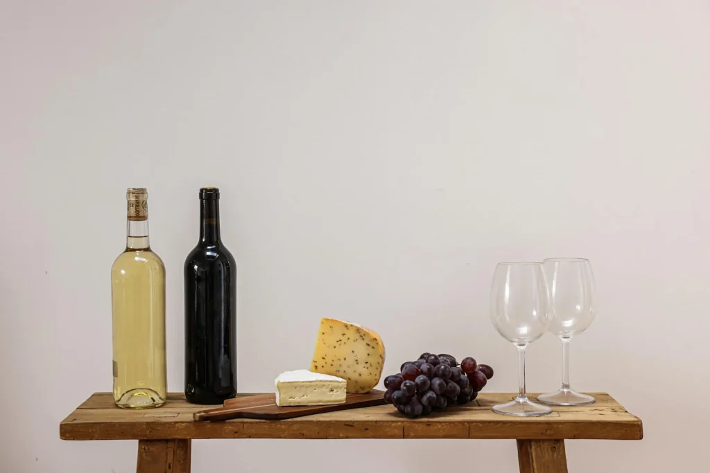 Homemade country wine bottles with elderflower and blackberry wine