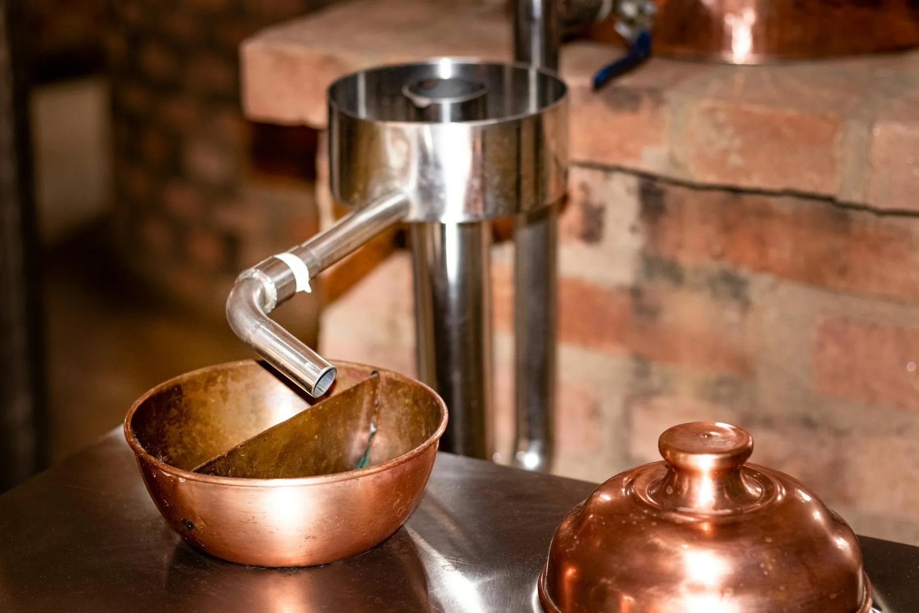 Homebrewing equipment on brew day with pot and hops