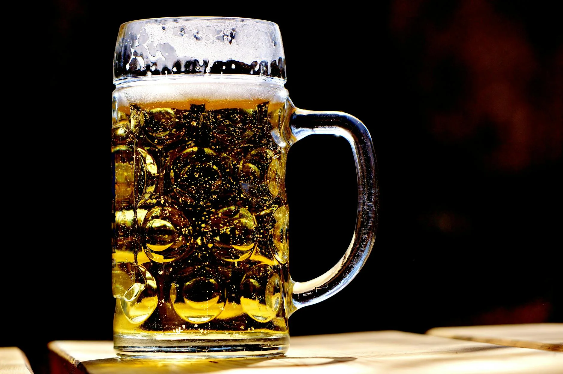 Glass of amber craft beer brewed at home