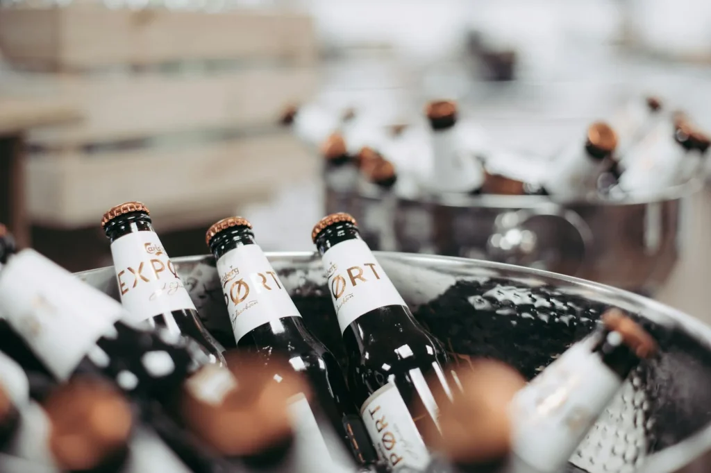 Brown glass homebrew beer bottles ready for capping