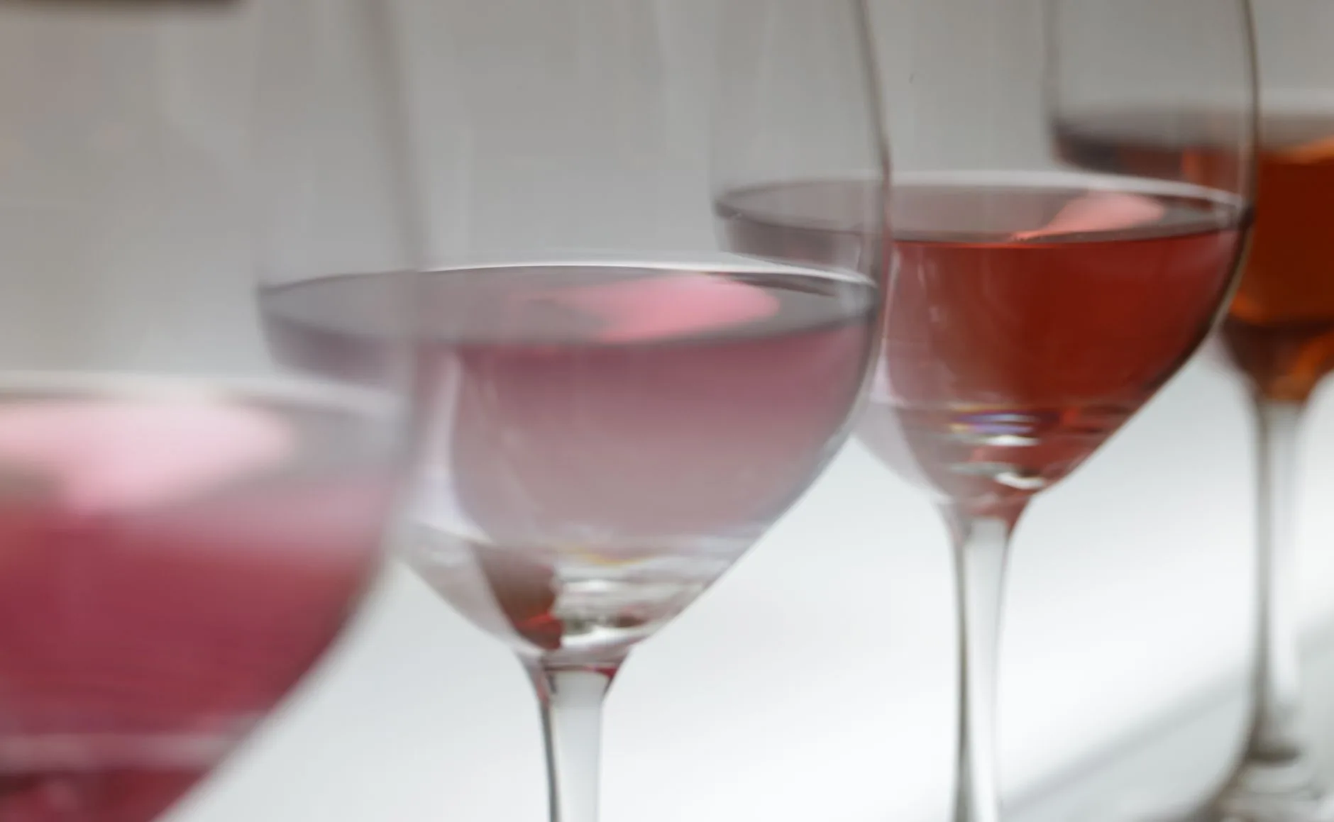 Hazy wine in a glass showing cloudiness during fault checks